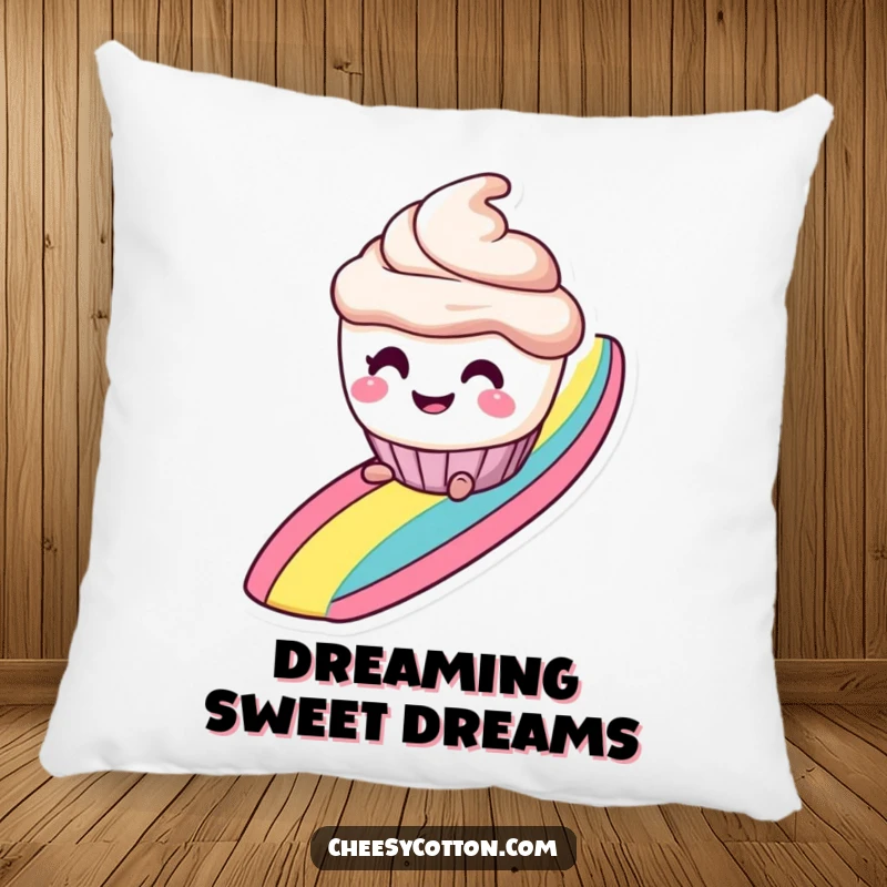 Funny decorative pillow with a smiling cupcake character with mischievous eyes, sliding down a rainbow, bringing sweet comfort.