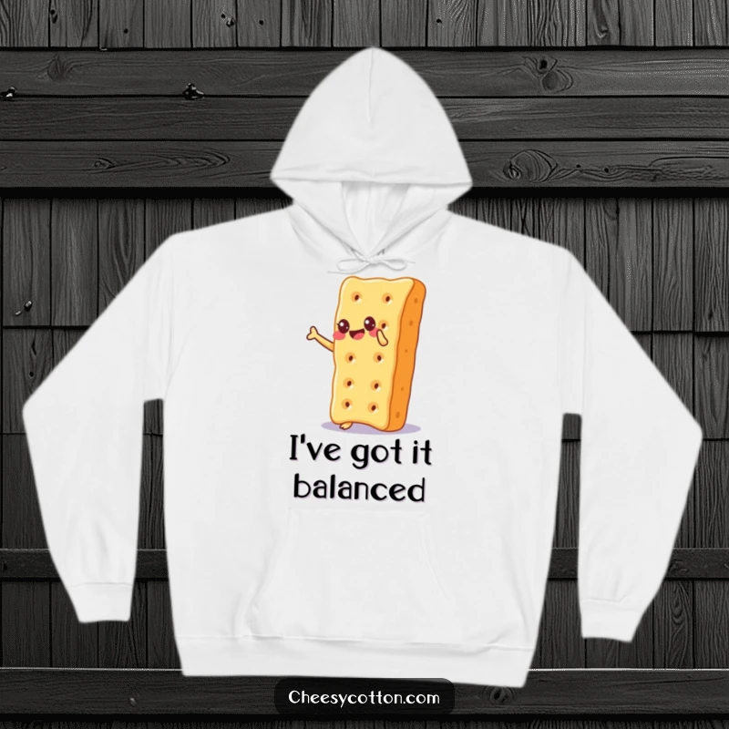 Funny Hoodie featuring a cheesy cracker character balancing on its corner with a look of sheer delight and carefree amusement.