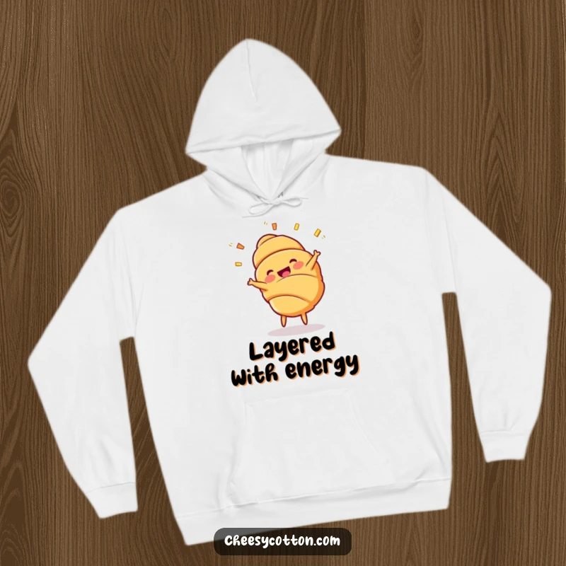 Funny Croissant Cartwheel Hoodie: A cozy hoodie depicting a cheerful croissant character in mid-cartwheel with layers flying.