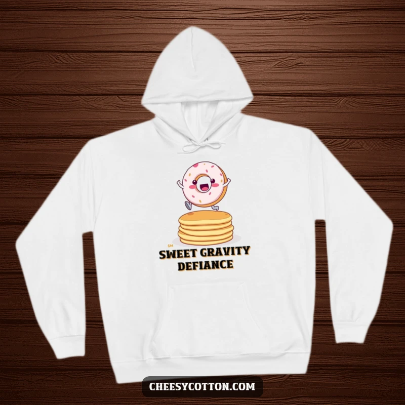 Funny Donut Pancake Leap Hoodie: A cozy hoodie depicting a determined donut character leaping over a stack of pancakes.