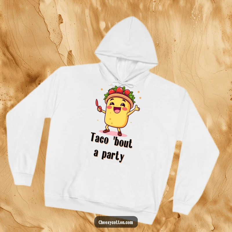 Funny hoodie depicting a happy taco character doing a celebratory dance with a chili pepper, ideal for warm, festive comfort.