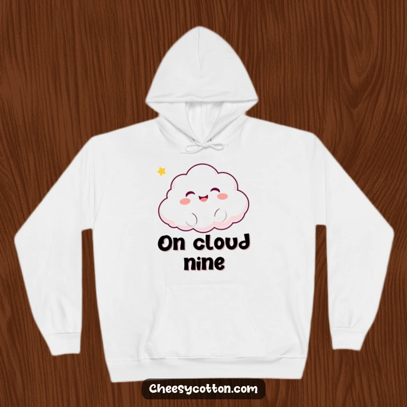 Funny Kawaii Cloud Hoodie: A soft, comfortable hoodie featuring a cheerful kawaii cloud character giggling while floating upwards.