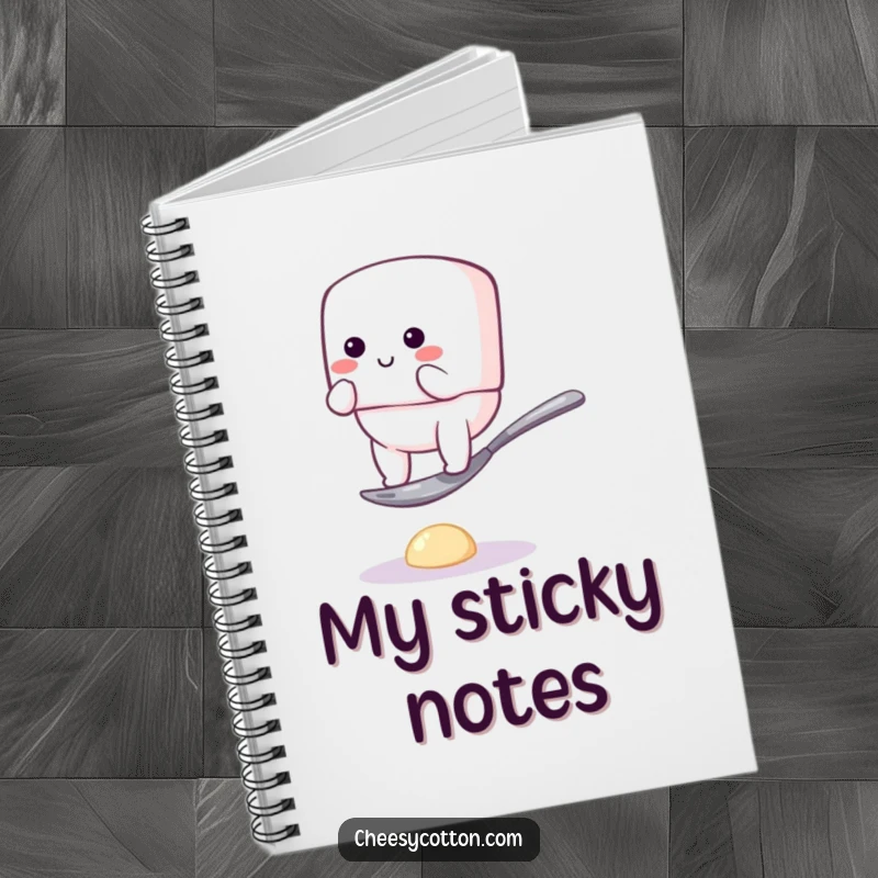 Funny notebook with a bouncy marshmallow character hilariously attempting to balance on a tiny spoon, a delightful companion for note-taking and journaling.