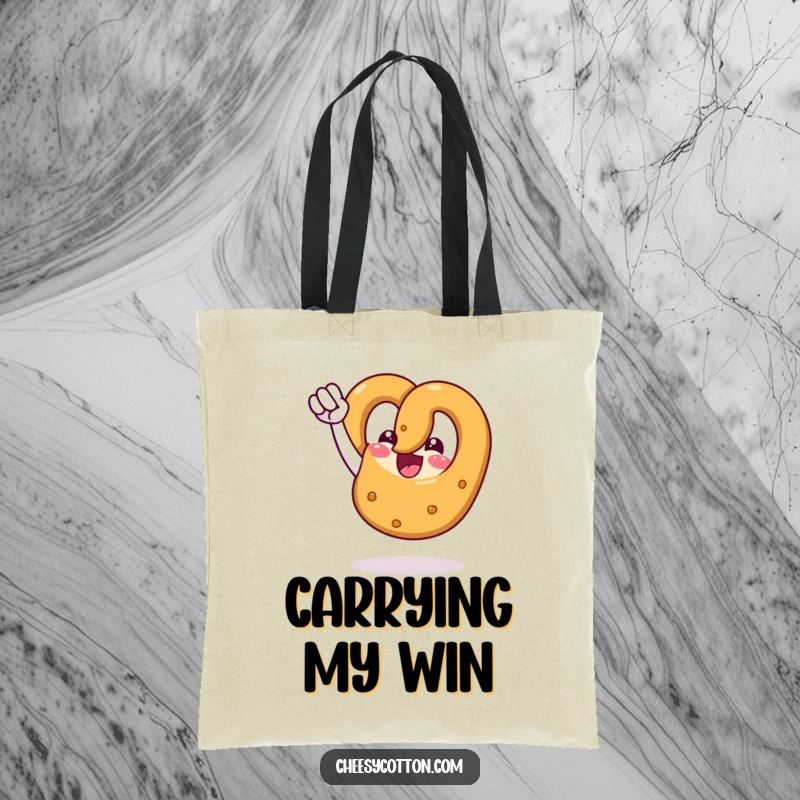 Funny tote bag illustrating a delighted pretzel character raising its fist in a gesture of ultimate victory and joy.