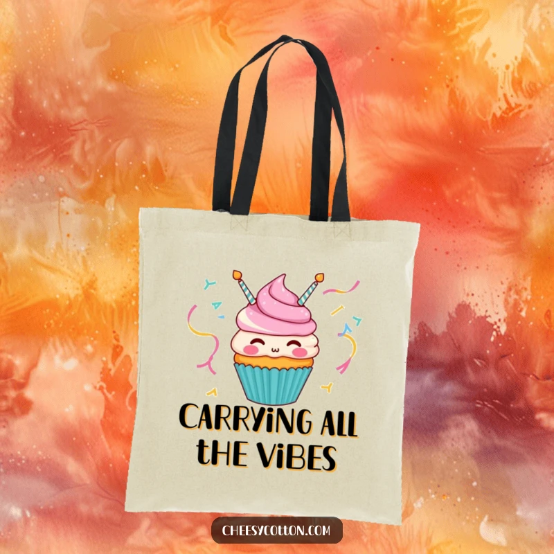 Funny tote bag featuring a happy cupcake character merrily blowing party streamers, ideal for carrying daily items.