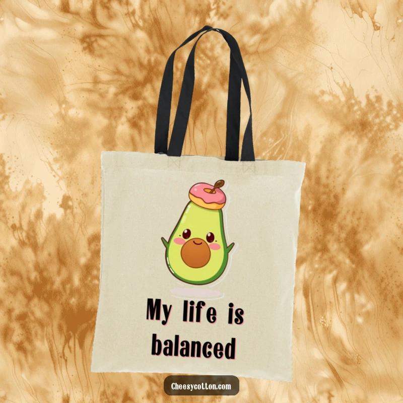 Funny Avocado Donut Tote Bag: A fun tote featuring a smiling avocado character balancing a donut on its head.
